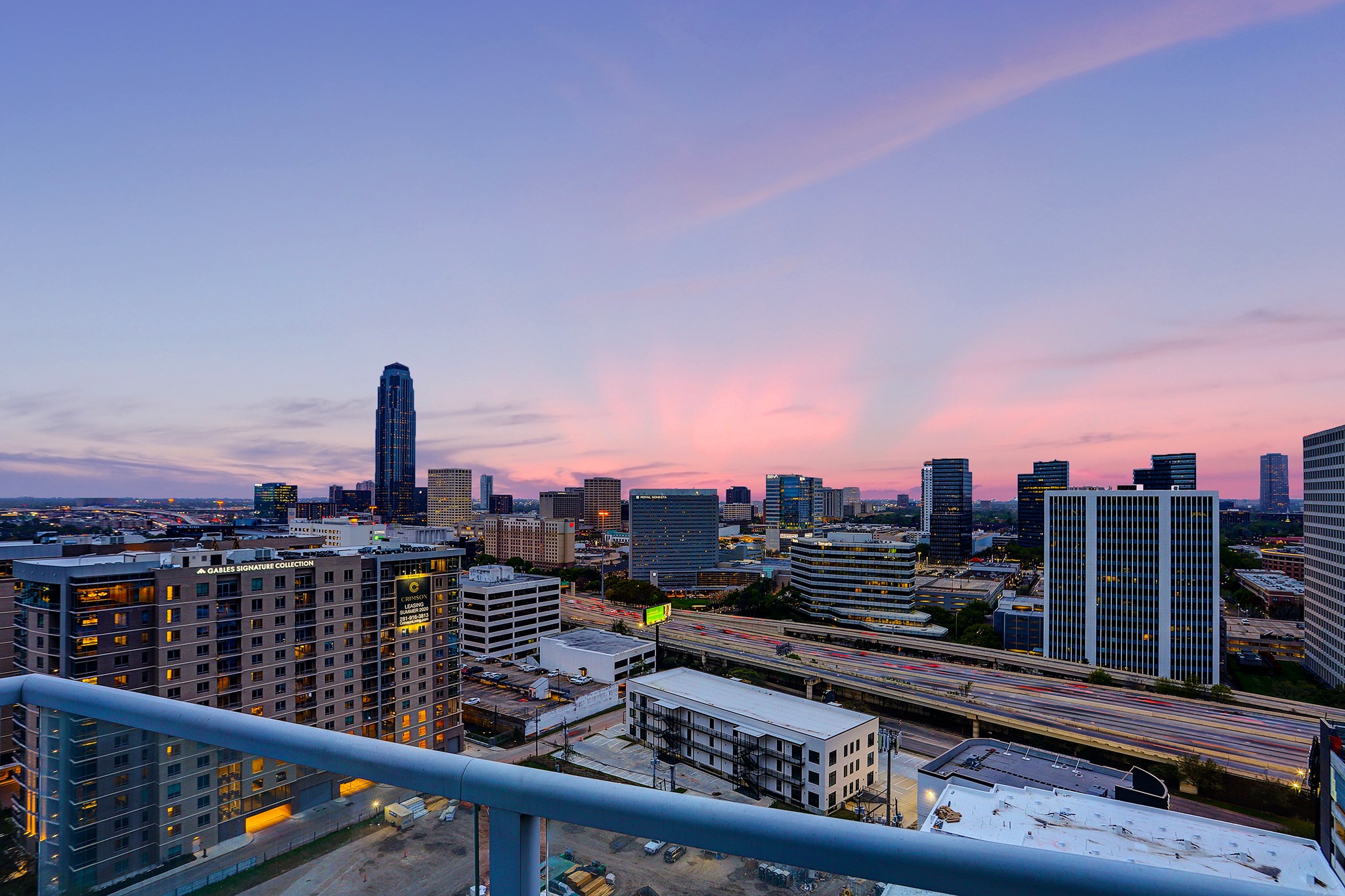 Enjoy expansive sunset views of the Galleria from the wide COVERED BALCONY and from plentiful floor-to-ceiling windows throughout the condo.