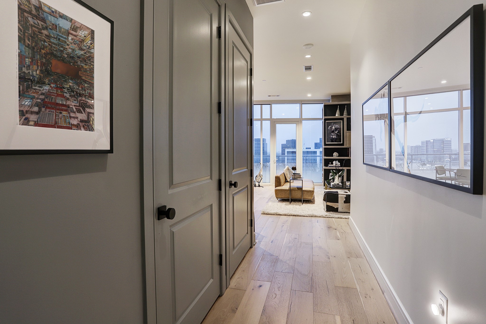The GALLERY ENTRY leads to a spacious Living Area & Kitchen.  Notice the timeless beauty of the wide-plank French oak flooring.