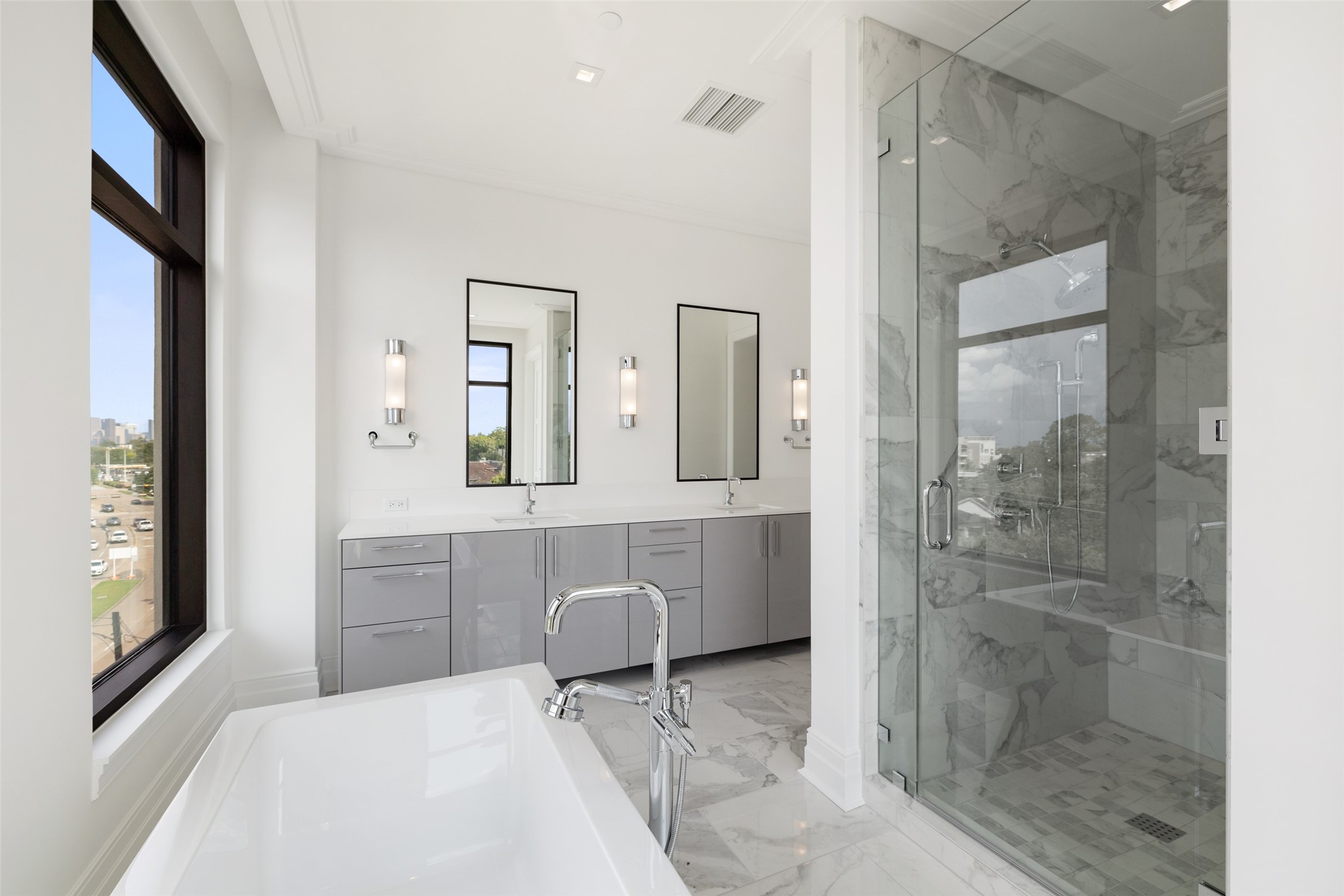 The Primary Bathroom also features a beautiful walk-in shower with bench.