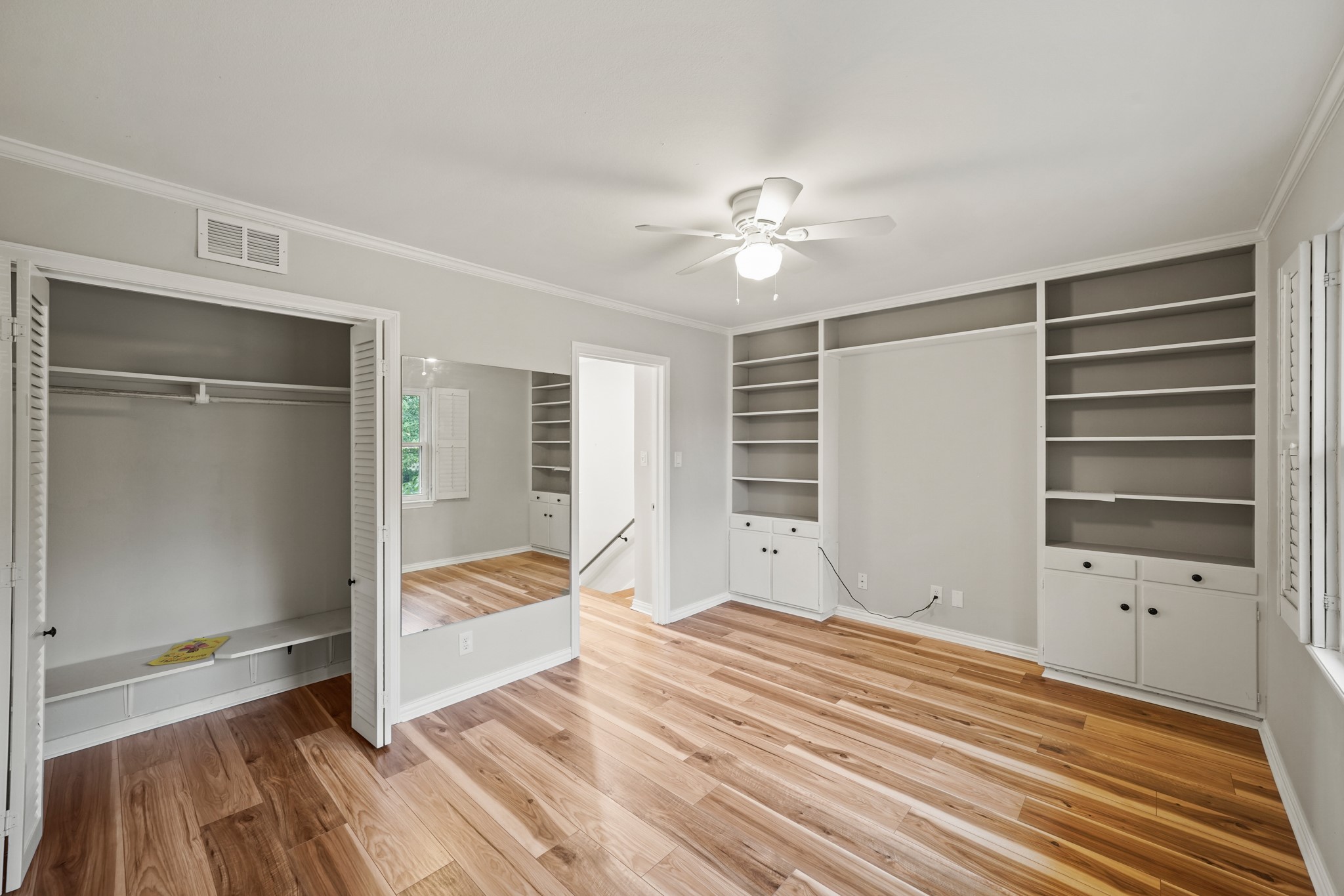 Great extra storage in the bedroom and wood floors.