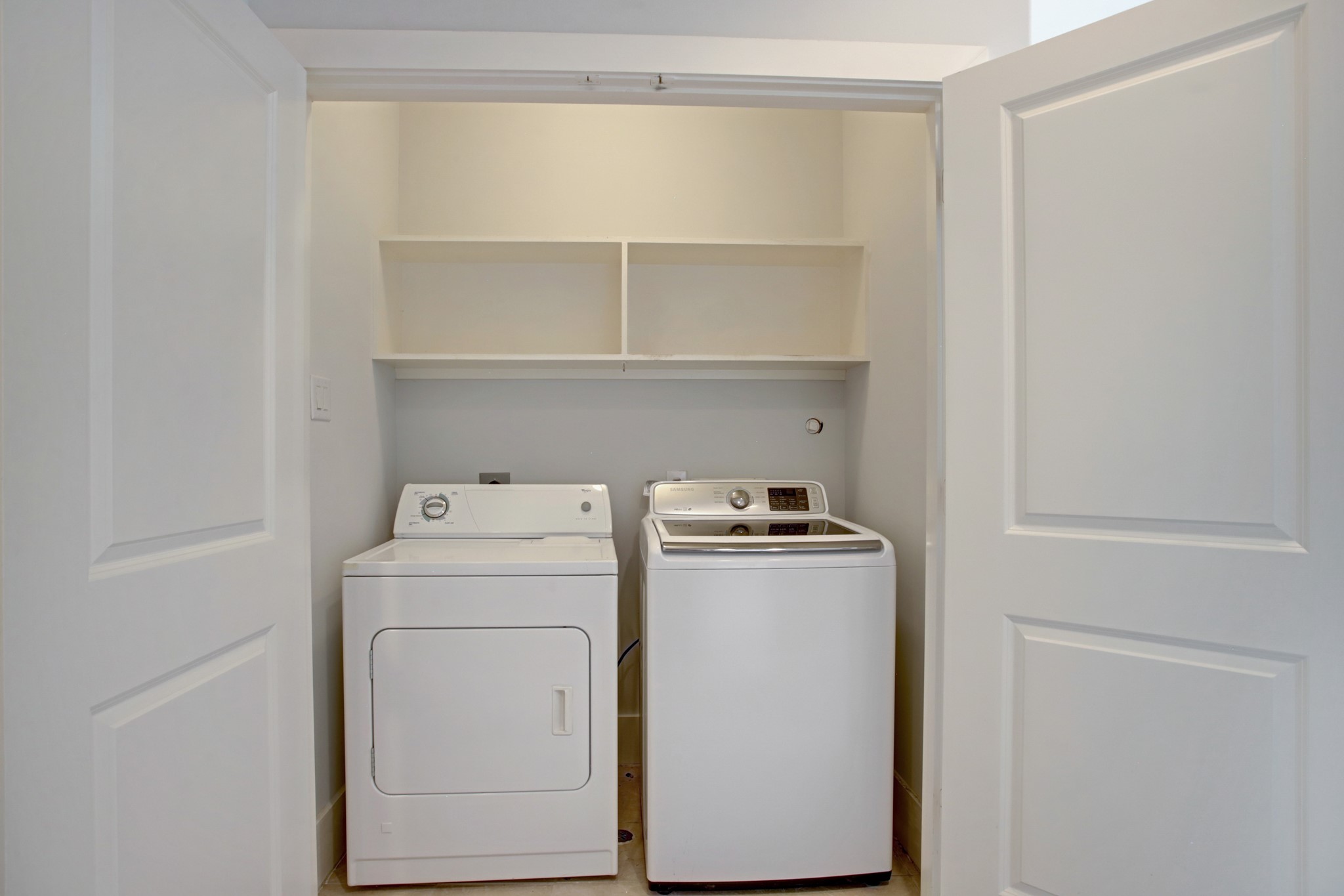 Laundry room 3rd floor. Full size washer and dryer.