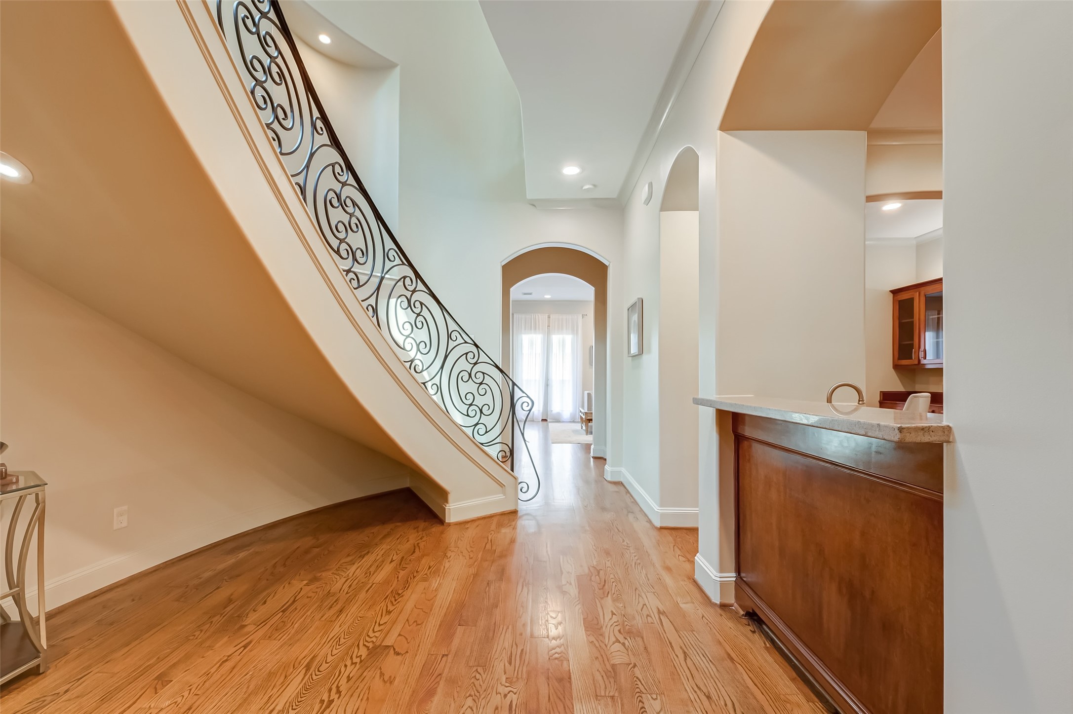 A grand and beautiful entrance way featuring  high ceilings, pristine hardwood & neutral colors. Elevator capable!