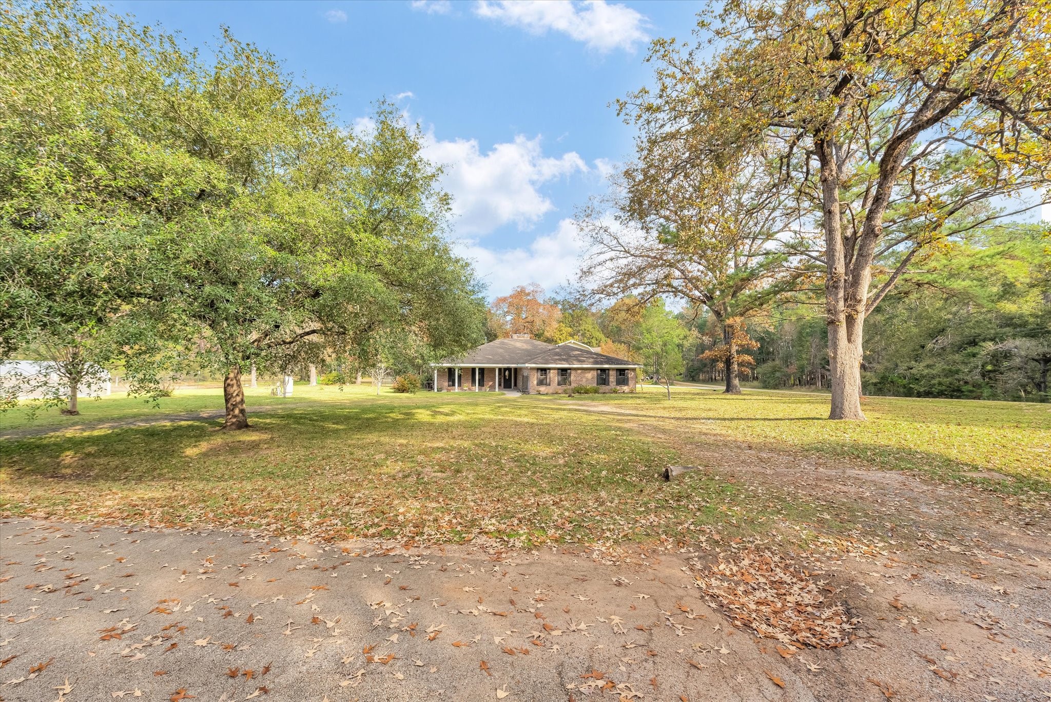Over 2.5 Acres in a Park Like Setting.  This one won't wait. Raising a family?  Need more Elbow Room?  Available for Immediate move-in.  Restrictions are for residential purposes.