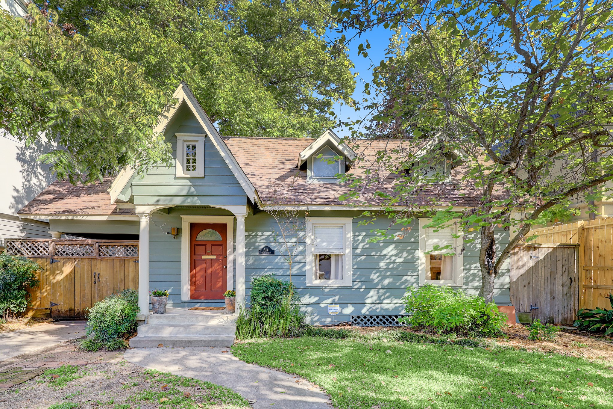 Triple Gable English Cottage in the Heart of the River Oaks Shopping Center!  This cozy home has wonderful curb appeal and a great floor plan.