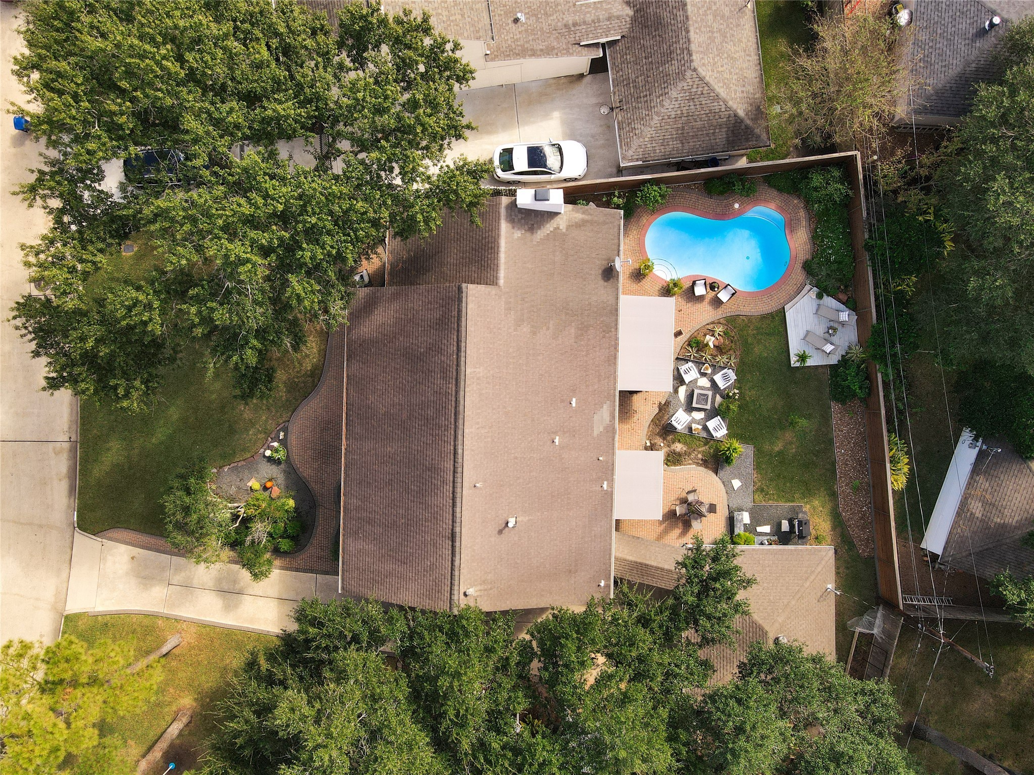 This rare Pie Estate lot has a double wide backyard that offers plenty of room for a pool, green space, and a garden!