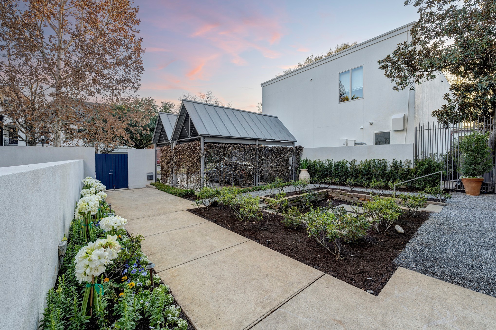 Professionally landscaped yard with sunken rose garden is a piece of natural art.