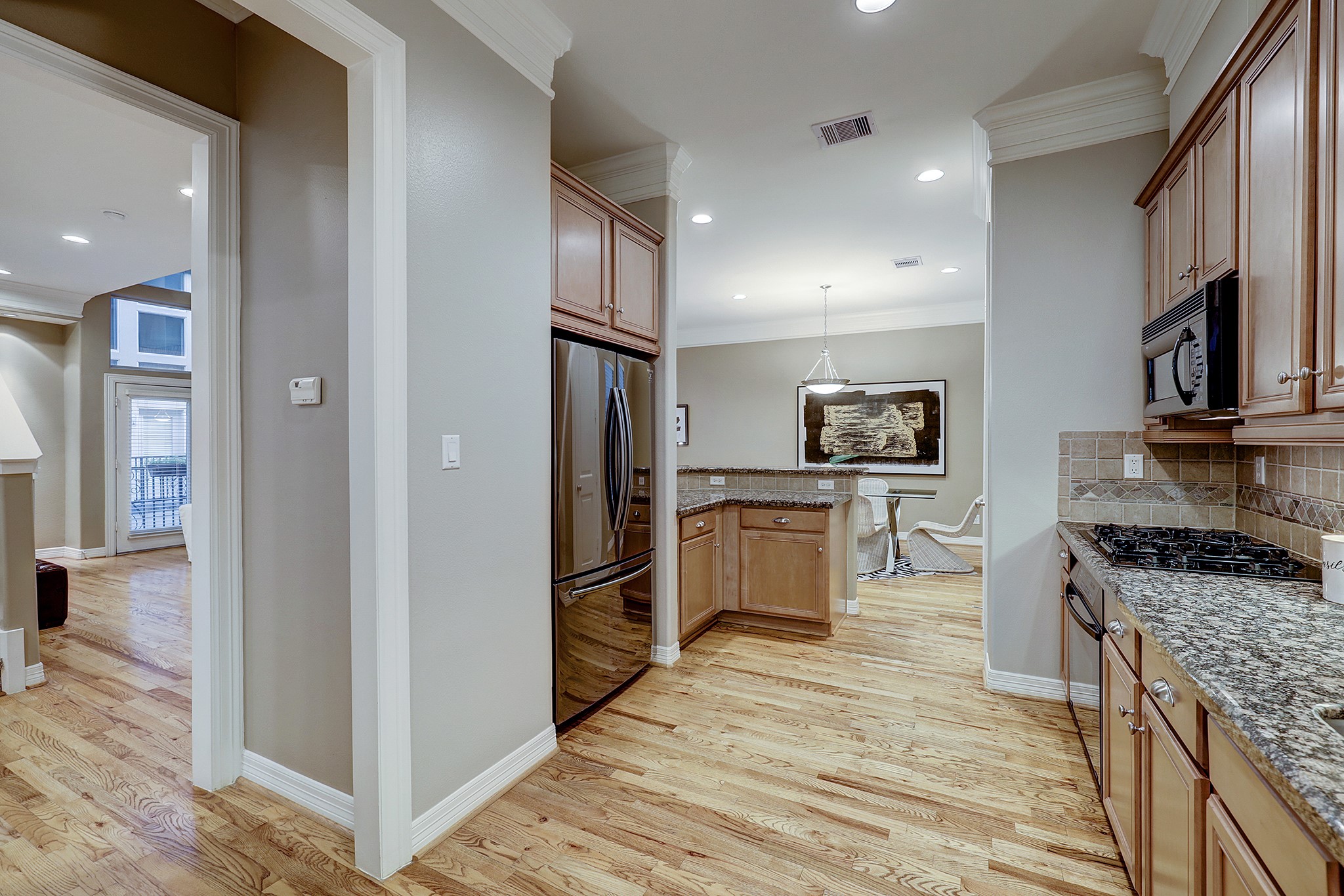 The kitchen is complete with ample storage.