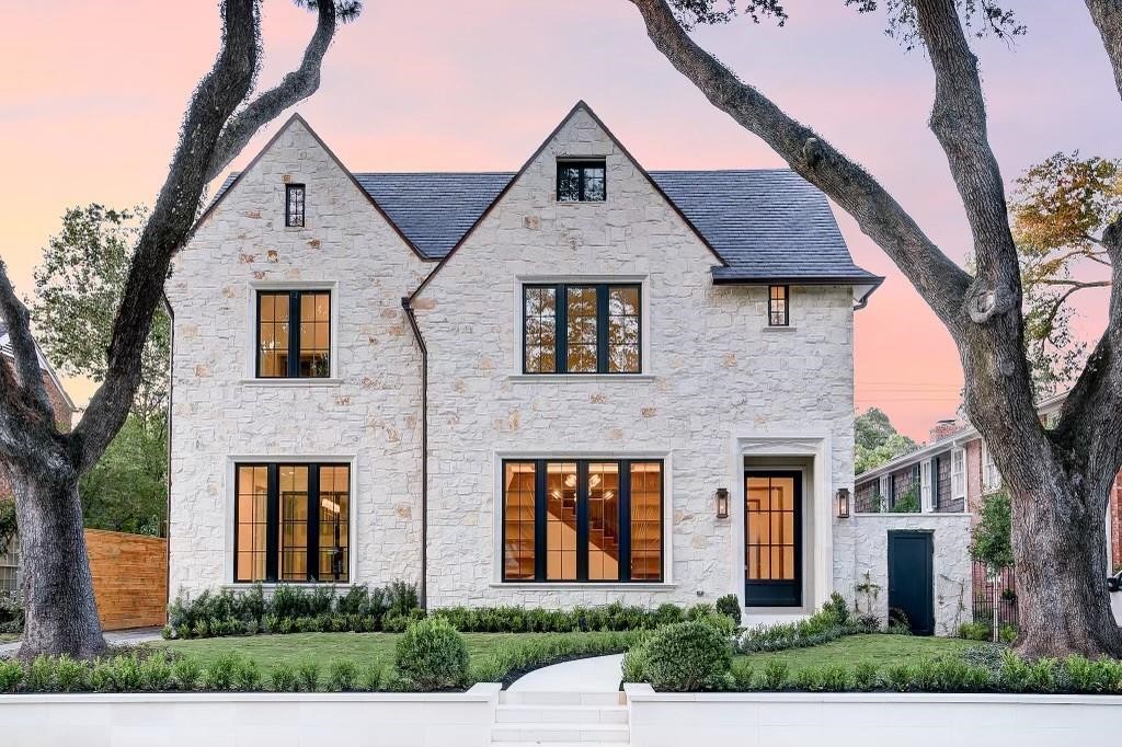 This new construction home by Fifty Seventh +7th, the Signature Division of Carnegie Homes, pulls inspiration from the architecture of the English countryside,