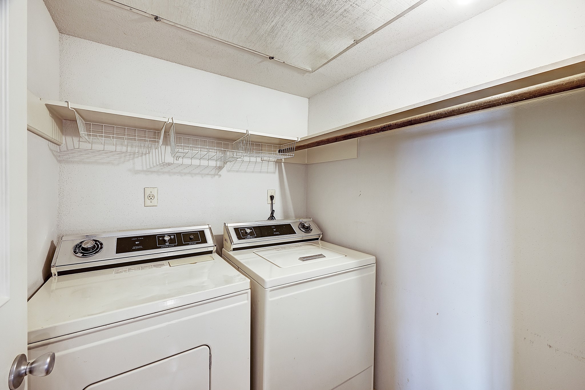 [Laundry Room]
Located on the second floor, the laundry room is near the primary and guest rooms.