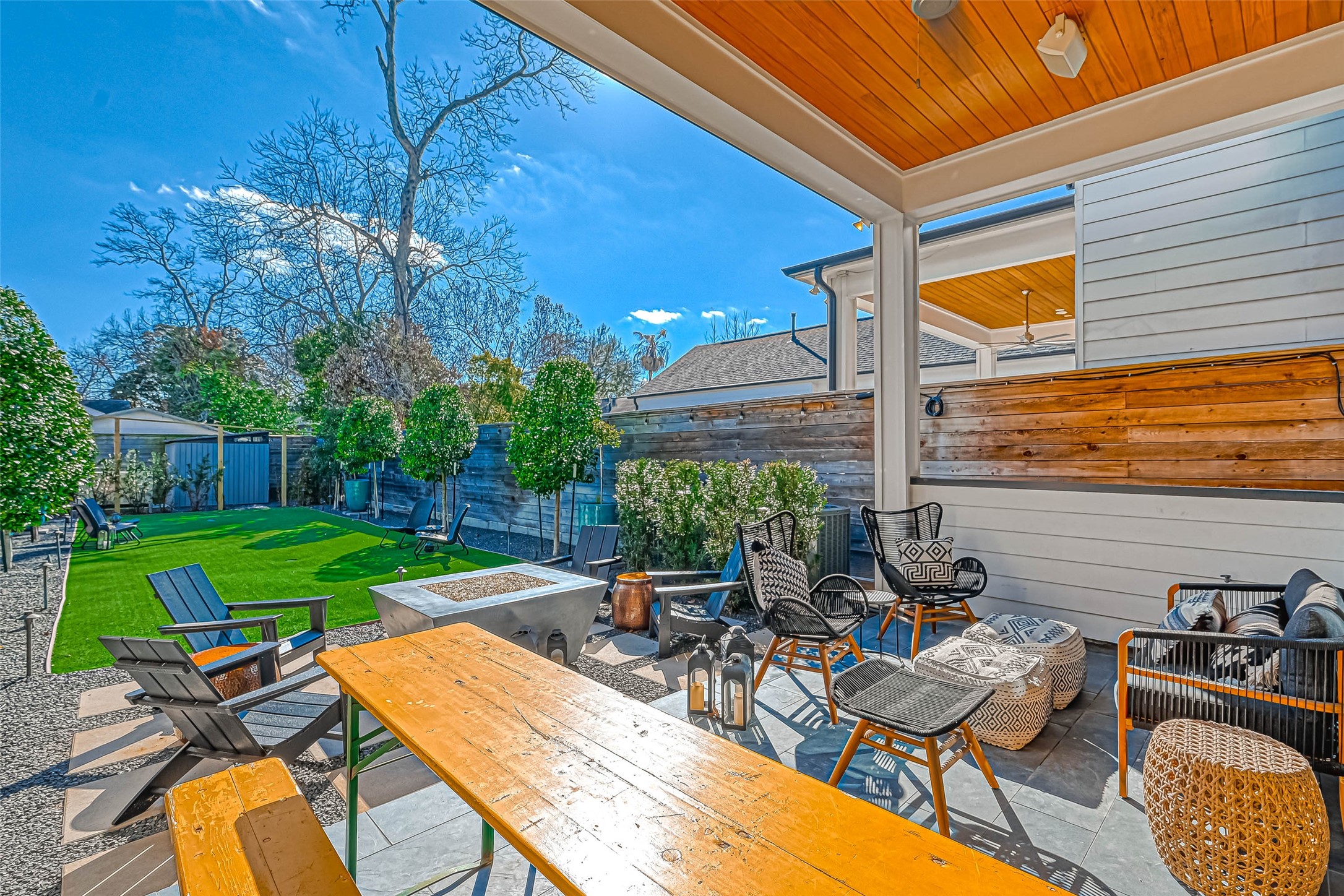 The covered backyard patio is a comfortable area to gather with friends. Add some outdoor
seating and perhaps a grill and you’ll be set to host a barbecue.