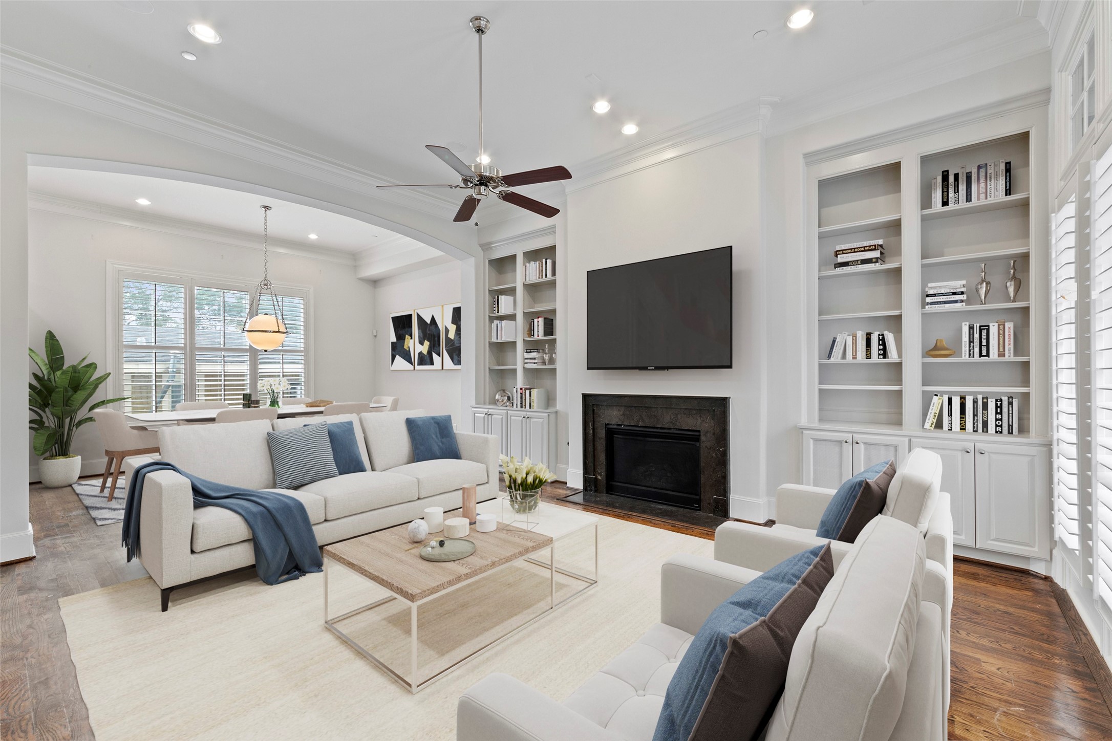 With a sneak peek inside before touring the garden entry, you'll find this four story corner townhome has an abundance of natural light, high ceilings and attention to detail everywhere.