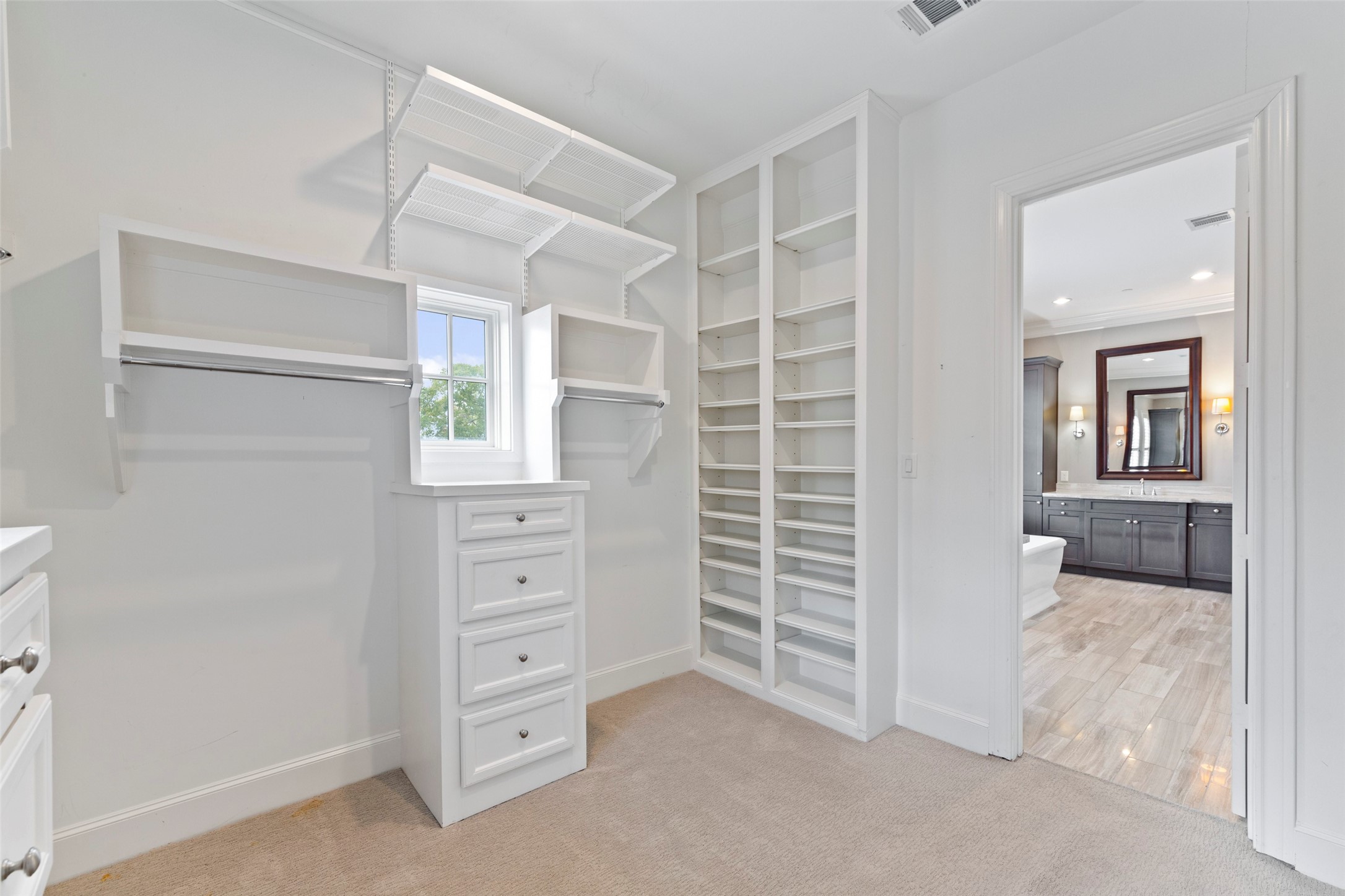 Do you have a few shoes and purses? This closet has all your storage needs covered!
