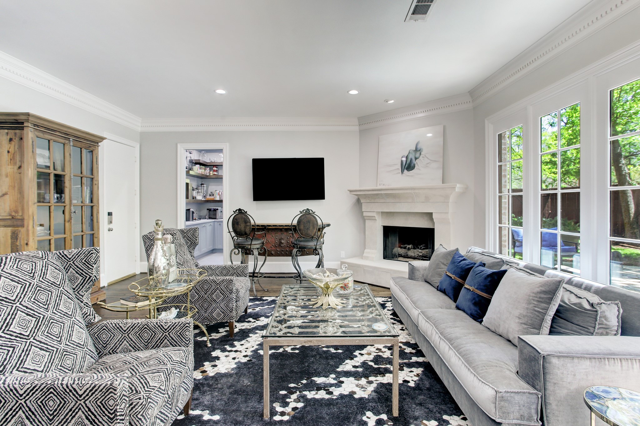 The sizable family room is anchored by a custom stone fireplace that was added in 2021.