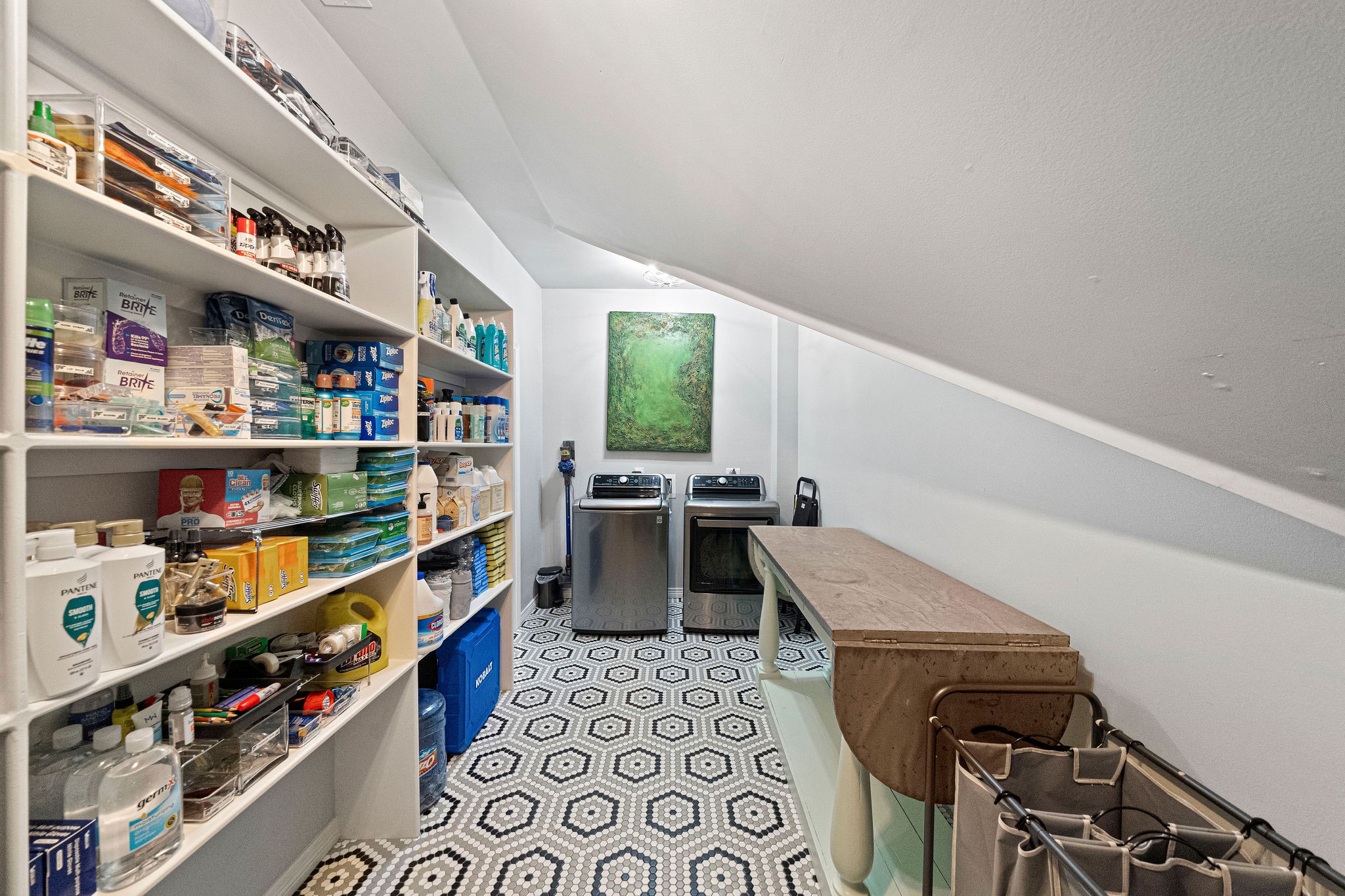 A second-floor utility room/pantry is located adjacent to the primary bedroom.
