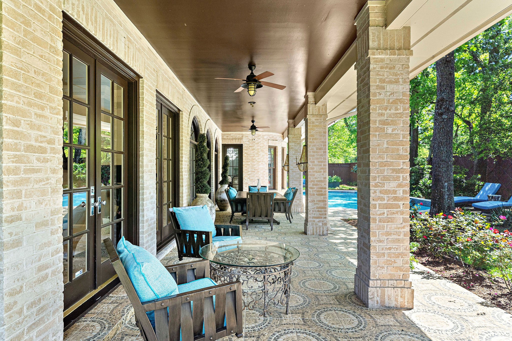 The inviting patio is perfect for entertaining with sitting and dining areas.