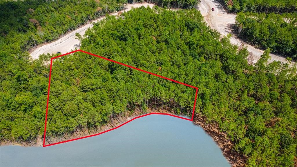 2.72 AC LOT WITH THE LARGEST LARGEST WATER SHORELINE OF THE 12 AC POND