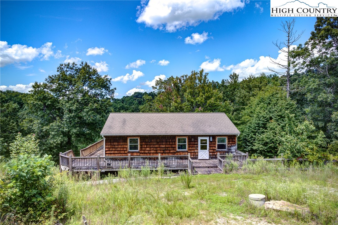 Beautiful mountain home on ten acres with mountain views! Great opportunity for privacy and land in Blowing Rock area where short term rentals are allowed.  Sitting on over 10 acres, this home is gem with many renovations left open ended for a buyers personal taste.