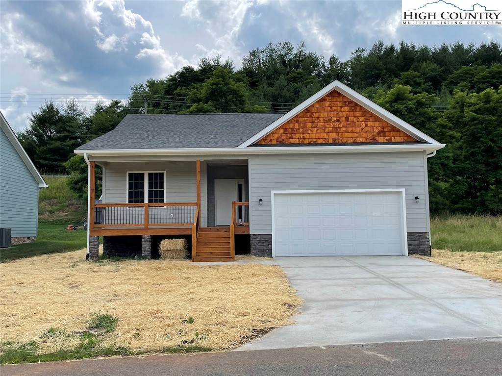 New Construction and Recently Completed Home in Taylor Glen, the ever popular and ever growing community just minutes from downtown West Jefferson. All one level homes. Less than 1 mile off new 221 4-lane, makes an easy commute to Boone and Wilkesboro. The home features 3BR,2BA, with Smartcore, waterproof flooring, that will not swell, crack, or peel, installed throughout. Open floor plan with kitchen/ dining area open into the great room, with fireplace. Recessed lighting in kitchen and porches, craftsman interior doors, ventilated vinyl coated shelving in closets. Split bedroom layout, with Master Suite on one side and guest bedrooms on the opposite side of the house. Shaker Style custom built kitchen and bathroom cabinets, with stainless steel appliances in the kitchen, and Granite Countertops in Kitchen and Bathrooms. Tub/shower combo in guest bathroom with Walk-in fiberglass shower. Concrete driveway and 2 car garage. Stone foundation and wood front porch and back porch. Exterior siding is LP Smart Siding, similar look as Hardie Board. Roofing shingles are limited architectural shingles and usually last about 30 years. See today