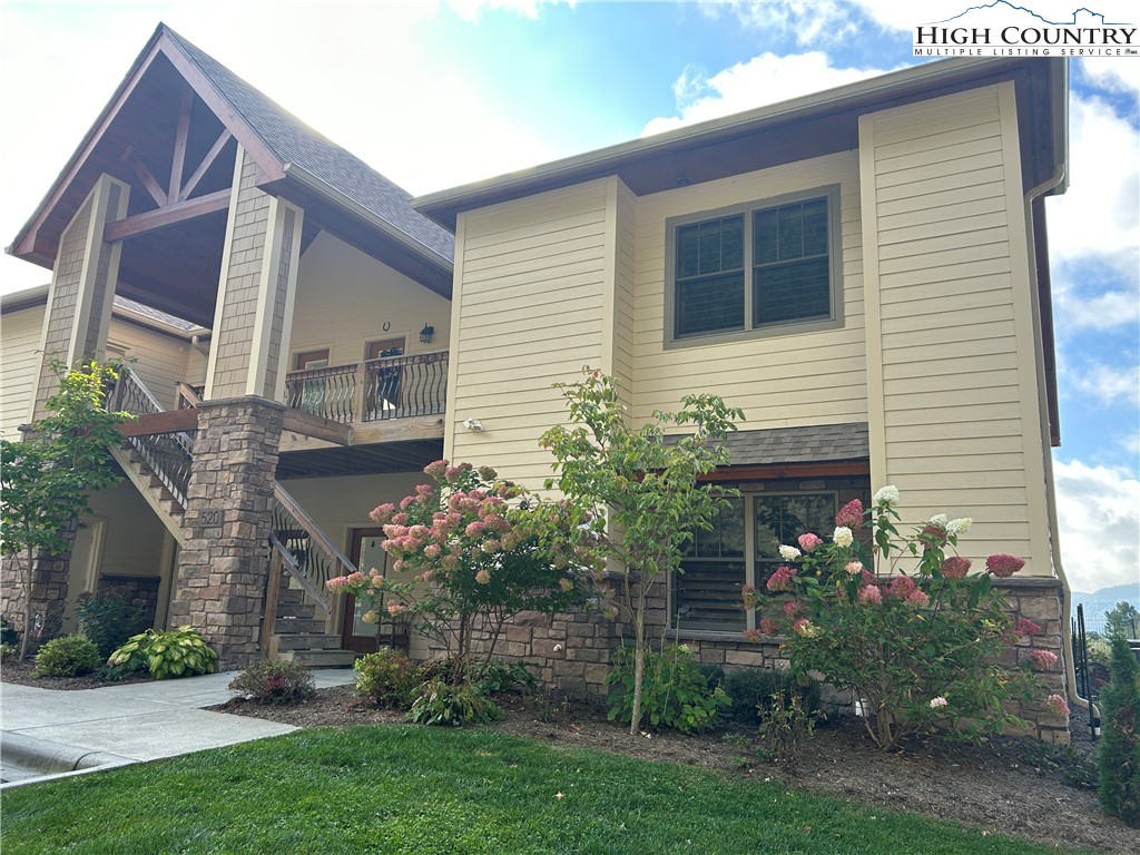 2018 condo is entry level, end unit. Two bedroom and two bath features long range views of Grandfather mountain. The spacious great room with a natural gas vented fireplace, as well as the primary bedroom open up to large, covered patio. Superior sound proofing between flooring and walls. Comes furnished with exception of TV's, flower arrangements, and master bedroom mattress.