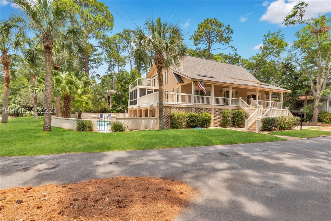 SECOND ROW ocean home currently has unimpeded view of the beautiful ocean-large corner lot with single family home displaying multiple decks and plenty of outdoor FUN space...enjoy the pool, grill dinner or just relax on a porch!
