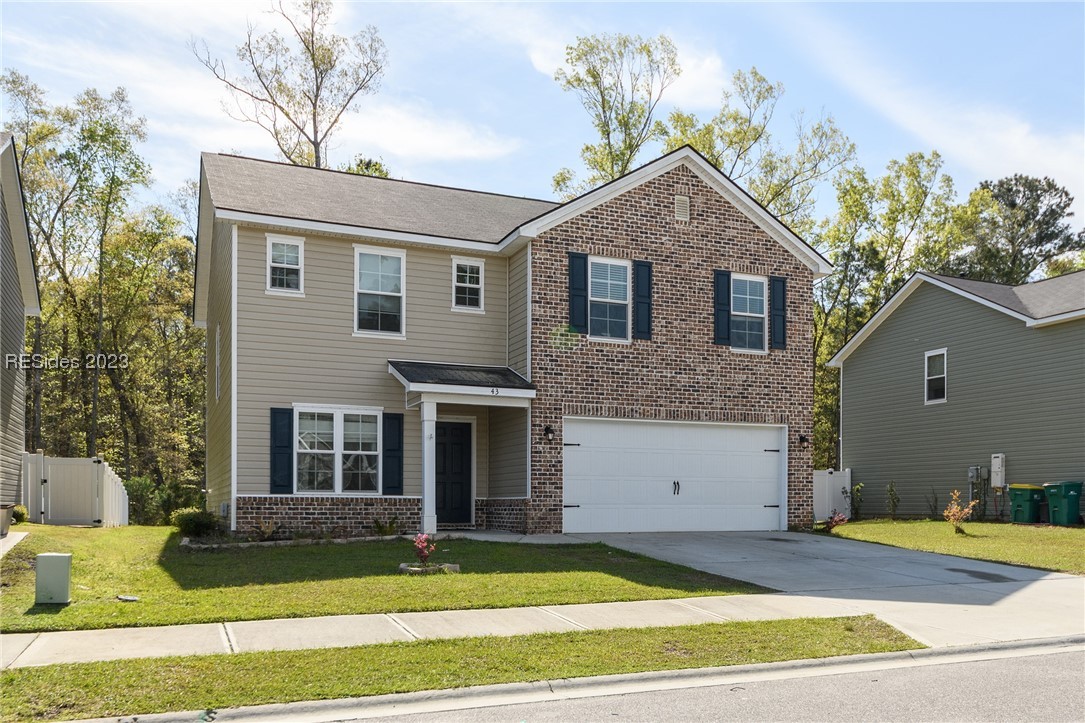 This 4 BR home is offers the beautiful brick accent exterior.