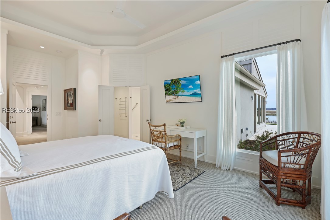 This guest suite enjoys a view of the water.