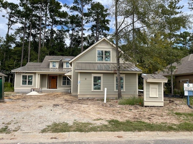 The new construction home has 4 bedrooms, 4 bathrooms, 1 half bath. Hardwood floors on 1st-floor, carpet on 2nd-floor, quarts kitchen tops, and stainless-steel appliances. Wooded view