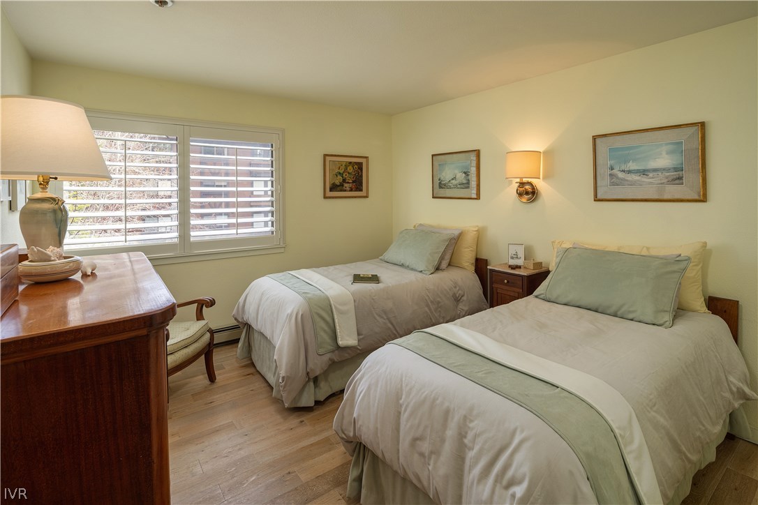 Photo #22: Guest Bedroom with Plantation Shutters