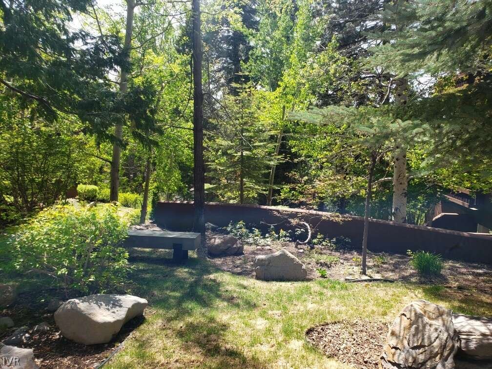 Photo #25: Garden area with bench