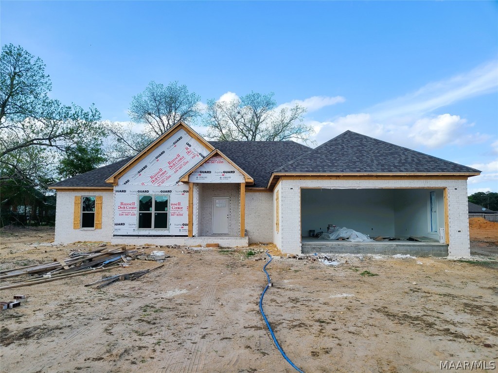 NEW CONSTRUCTION in the PIINE LEVEL/MARBURY school district! Located in the well established Waterstone neighborhood located right in the heart of the fast growing Pine Level area. There are so many extras including underground power and the convenience to the interstate! This home offers a split floor plan with beautiful finishes! The builder goes above and beyond to make the home feel more like a custom build than a spec house. The exterior features brick, stone & a 2 car garage! You will find intricate details throughout the home that make it one of a kind from the large kitchen island with a beautiful accent color on the cabinet itself as well as the white accent quartz countertop that compliments the tile backsplash & black granite lower kitchen cabinet countertops and ties in perfectly to the primary bathroom double vanity which also offers a herringbone accent wall in the walk in tile shower giving the room an elegant feel. The primary bathroom also features a shiplap accent wall above the double vanity to give more of the custom
feel that comes standard with the builder's product. You will feel right at home in the large living space with a cozy stone fireplace with a natural wood mantel & recessed lighting. The living space overlooks the spacious back yard & covered back porch with a stone, wood burning fireplace for outdoor relaxing & entertaining. The 3 guest bedrooms & bathroom are located to the opposite end of the home from the primary suite. The bathroom features granite countertops & also has a shiplap wall behind the double vanity. The earth tones & textures in the herringbone tile floor coupled with the farmhouse style light fixtures tie the room in perfectly! There is also a large closet near the front door, a spacious pantry in the kitchen, an oversized laundry room with granite countertops and much more! This home has to be seen to truly appreciate the craftmanship & quality that the builder puts in. Photos are ex. of finished product.