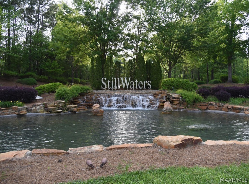 Welcome To StillWaters a Sought After Community located in Lake Martin! This New Construction home has 
3 bedrooms 2 baths with an unfinished flex room. This Immaculate home was built in 2021 with Upgrades Galore! As you come through the door you will be pleasantly surprised with the The Open Floor Concept this home has to offer! Interior color selections makes decorating a Breeze! Custom Kitchen Soft Close cabinetry boasts under lighting with Quartz Counter Tops and a enclosed spice rack and a discreet trash compartment. Not to mention theres a Upgraded Farm House Sink with Posh Silver Accents looking over to the Great Room with a Fireplace! Recess lights are in the common areas, Exquisite Book shelving is in the Great Room! Large SPA shower with Upgraded Rain Shower Head and a bench in Gorgeous master bath will Impress! A Vanity is included in the Master for all grooming accommodations. As a Bonus LED lights are installed under the master bathroom faucets for visibility during night hours usage. There is even a butlers pantry with upgraded cabinets to display all fine china pieces! The laundry room leads to the garage for complete functionality. Laminate Flooring has been installed in the home giving the home a Phenomenal Flow! Walking out the back door you will find a custom deck that overlooks the rustic scenery in the back yard making this a Private Setting! The home sits on 1/2acre landscaped and wooded lot. Close proximity Lake Martin, restaurants and shops. StillWaters offers so much for its low cost yet effective home owners association, with a swimming pool, tennis courts, fishing ponds, golf course and playground! Enjoy a moment on the private back porch, or take a short golf cart ride to Coppers for the evening while enjoying your favorite meal and drinks! Bring your boat and store it at Harbor Point full storage Marina and start enjoying the many perks of Lake Martin! Please call Your Favorite Realtor and Book Your Private Showing Today!