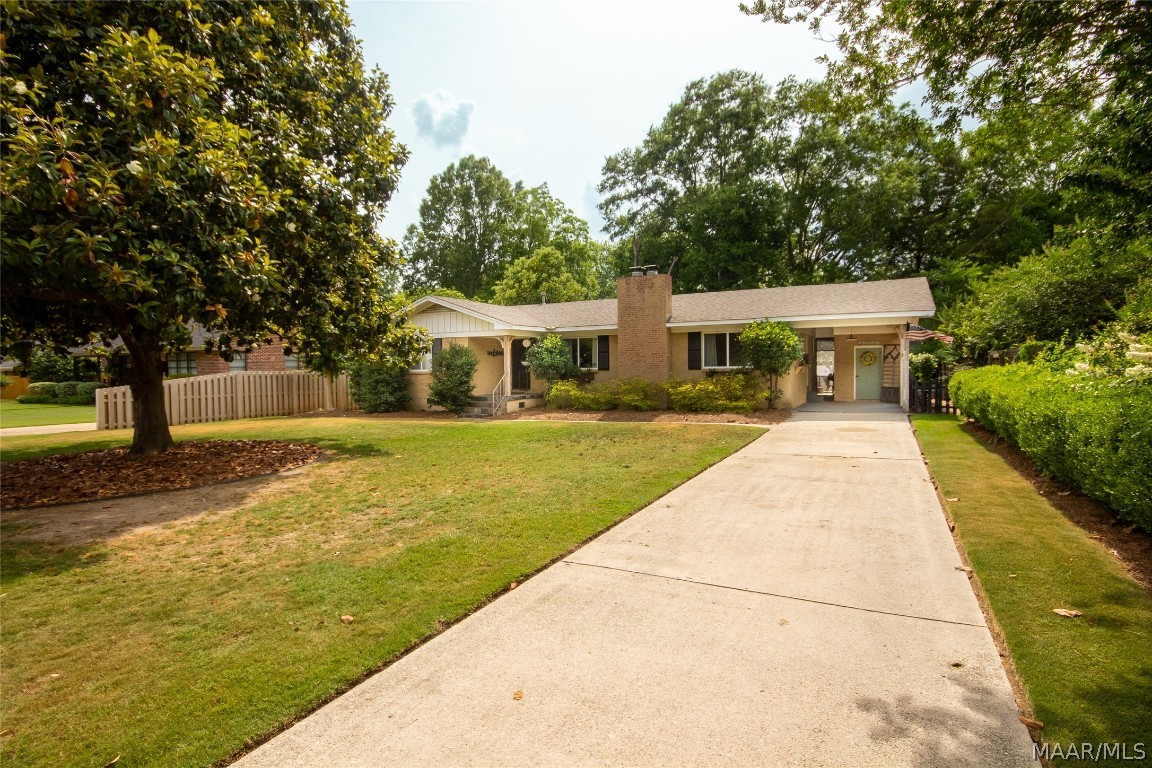 BEAUTIFULLY REMODELED and STUNNINGLY REDONE home in the heart of downtown Wetumpka. Close to everything: schools, churches, parks, restaurants, etc. The exterior of this home welcomes you into it with open arms, from the beautifully accented front porch to the stylish brick with mortar wash finish. As you enter the home, the large living room with 2 HUGE windows and a gorgeous fireplace will certainly catch your eye. The kitchen is newly renovated with very fashionable granite countertops and beautifully accented cabinets. The cozy sitting room just off the kitchen is the perfect place to relax and unwind. Hall bath with granite countertops and tile shower with jetted tub. The master bath has character galore with an eye popping vanity and light fixture on an innovative clapboard accent wall and a tile shower. The over sized master bedroom has plenty of space for you and your family, and lets in massive amounts of natural light. Door to the backyard from master bedroom. Screened in porch from the side leads to a back deck and a beautifully landscaped yard with patio space, outdoor entertainment space, plenty of grass, outdoor shower, and a quaint shed/ man cave with full electricity and an attached storage shed. You wont want to miss this one! Call me today at (334) 452-2478, and make it yours!