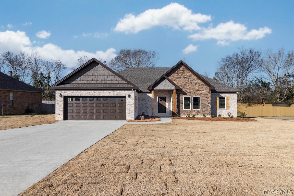 NEW CONSTRUCTION in the PIINE LEVEL/MARBURY school district! Located in the well established Waterstone neighborhood located right in the heart of the fast growing Pine Level area. There are so many extras including underground power and the convenience to the interstate! This home offers a split floor plan with beautiful finishes! The builder goes above and beyond to make the home feel more like a custom build than a spec house. The exterior features brick, stone & a 2 car garage! You will find intricate details throughout the home that make it one of a kind from the large kitchen island with a beautiful accent color on the cabinet itself as well as the white accent quartz countertop that compliments the tile backsplash & black granite lower kitchen cabinet countertops and ties in perfectly to the primary bathroom double vanity which also offers a herringbone accent wall in the walk in tile shower giving the room an elegant feel. The primary bathroom also features a shiplap accent wall above the double vanity to give more of the custom feel that comes standard with the builder's product. You will feel right at home in the large living space with a cozy stone fireplace with a natural wood mantel & recessed lighting. The living space overlooks the spacious back yard & covered back porch with a stone, wood burning fireplace for outdoor relaxing & entertaining. The 3 guest bedrooms & bathroom are located to the opposite end of the home from the primary suite. The bathroom features granite countertops & also has a shiplap wall behind the double vanity. The earth tones & textures in the herringbone tile floor coupled with the farmhouse style light fixtures tie the room in perfectly! There is also a large closet near the front door, a spacious pantry in the kitchen, an oversized laundry room with granite countertops and much more! This home has to be seen to truly appreciate the craftmanship & quality that the builder puts in. Photos are ex. of finished product.