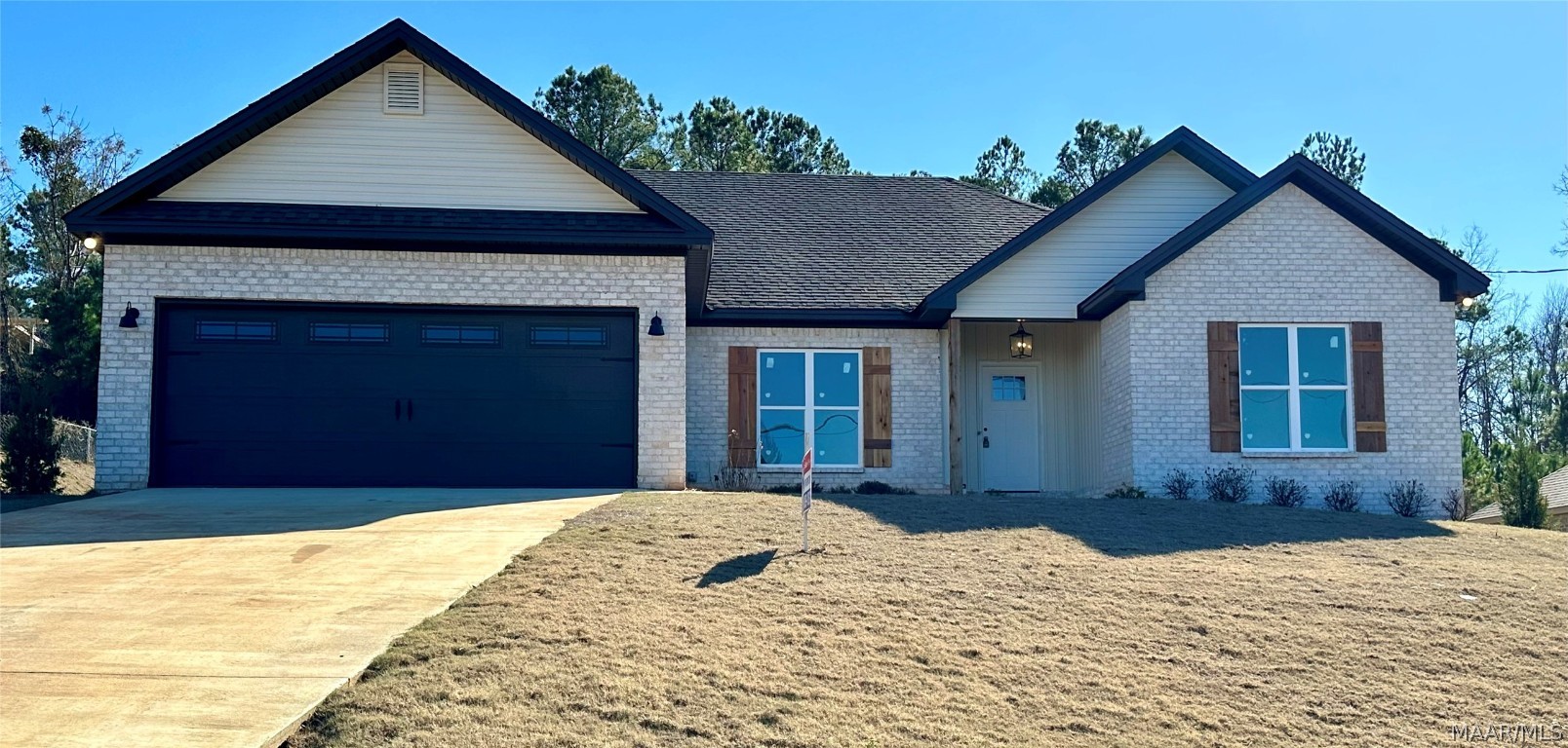 BUILDER will contribute $7500 in seller concessions. You can use this for closing costs, buying down your interest rate, etc.  Affordable new build in the Redland school district!  4 bedrooms/ 2.5 baths/ outdoor fireplace/ located in a small, quiet subdivision off Dozier Rd in the Redland community of Wetumpka, AL.  Great open floor plan with vaulted ceilings in the great room and guest bedroom.  LVP located throughout the house- beautiful water and scratch resistant flooring.  Custom made cabinets, quartz counter tops- such a soothing finish! There is also a separate dining room area- no dining room furniture?  No problem- use it as a separate den, playroom or office. You will love the closet space in this one- especially the Master closet!  Come take a look today!!