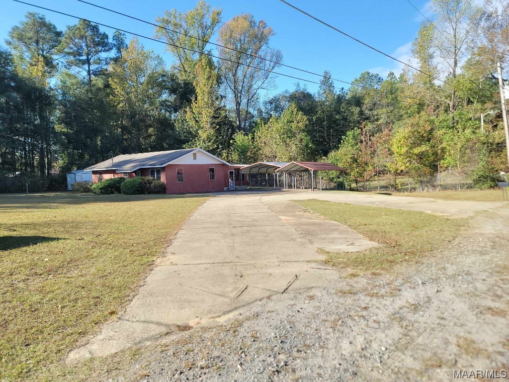 3 bedrooms 1 bath home in Wetumpka, AL, nestled on a secluded road with privacy. Ample covered parking adds convenience. Ideal for investors seeking a project—this gem just needs a little TLC to shine! Sold As Is.