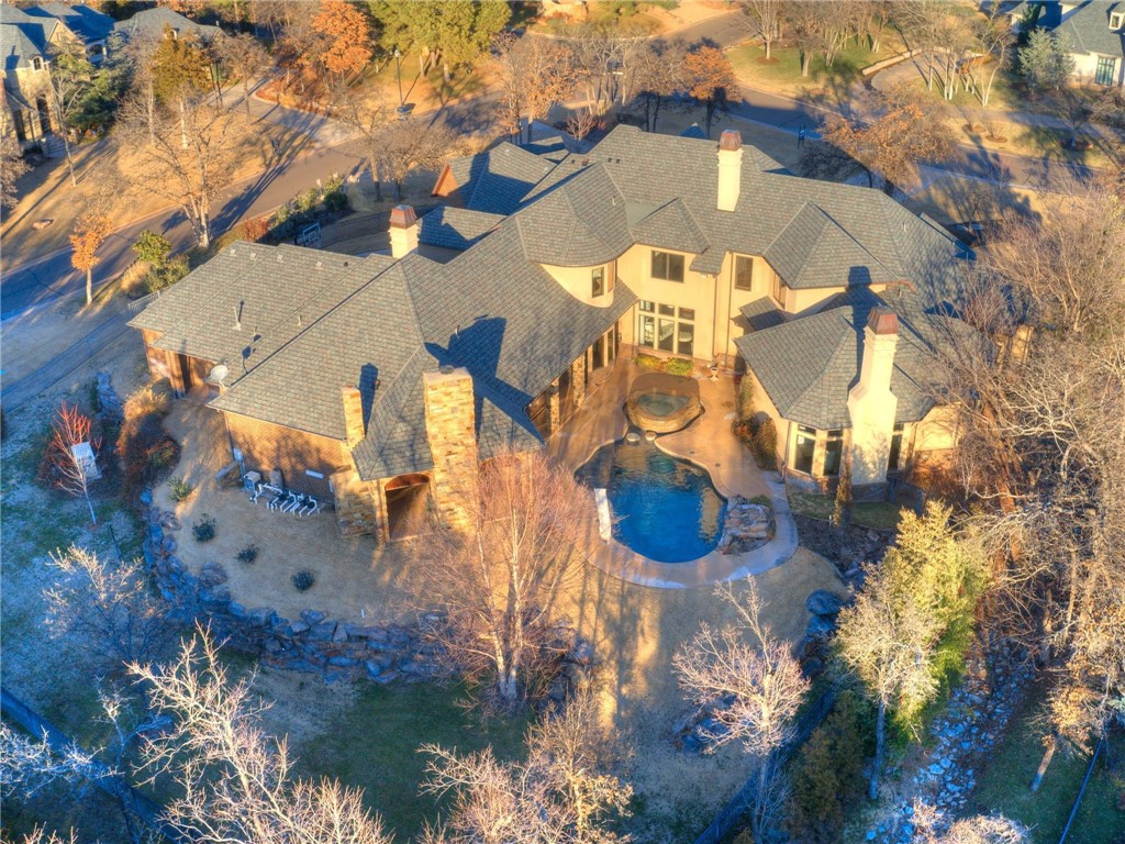 11649 Mill Hollow Court, Oklahoma City, OK 73131 view of drone / aerial view