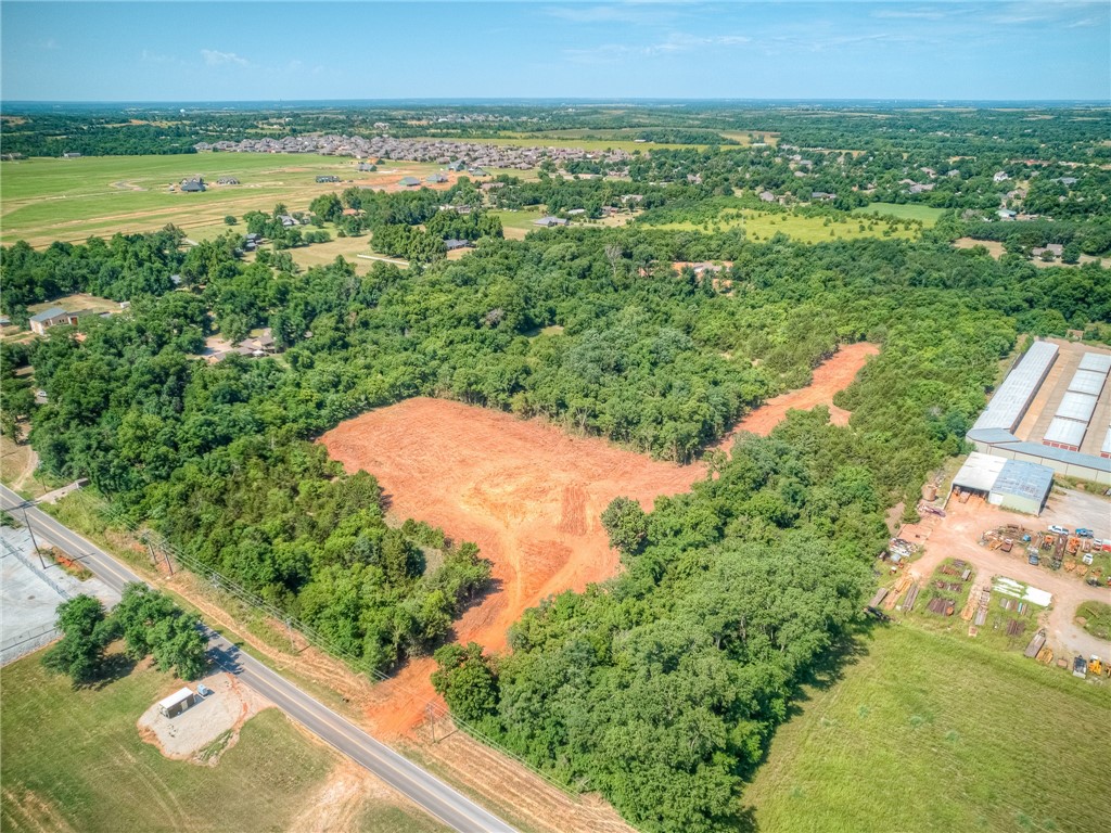 Development opportunity in growing area! 16.35 acres, Zoned C-1 and has a 12" water line on the East boundary. Great location near Riverwind Casino, just South of Hwy 9 on 24th/Santa Fe Ave. Goldsby City limits. Property will qualify for several water meters. City of Goldsby will start construction soon for nearby booster station that will allow for a virtually unlimited water supply to this tract for future development.