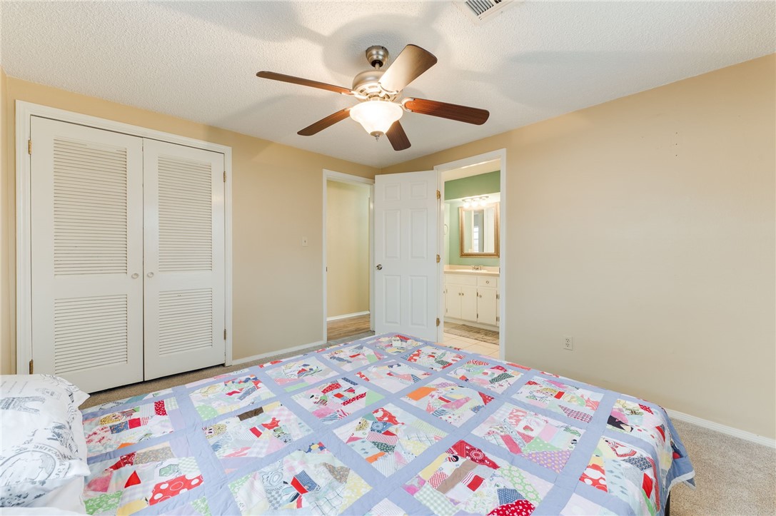 3712 N Markwell Avenue, Bethany, OK 73008 carpeted bedroom featuring a ceiling fan