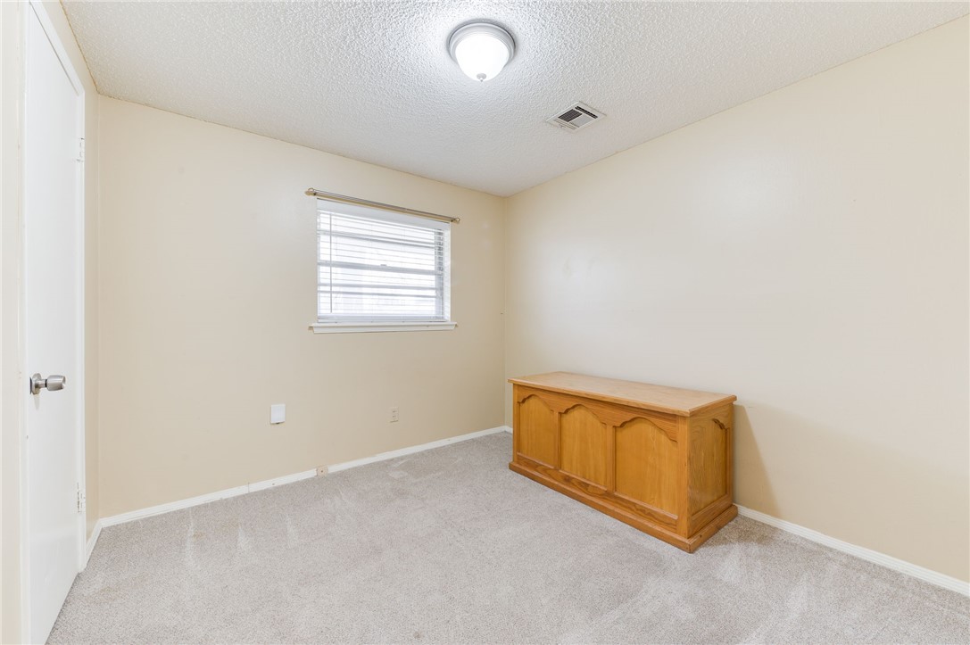 3712 N Markwell Avenue, Bethany, OK 73008 carpeted spare room with natural light