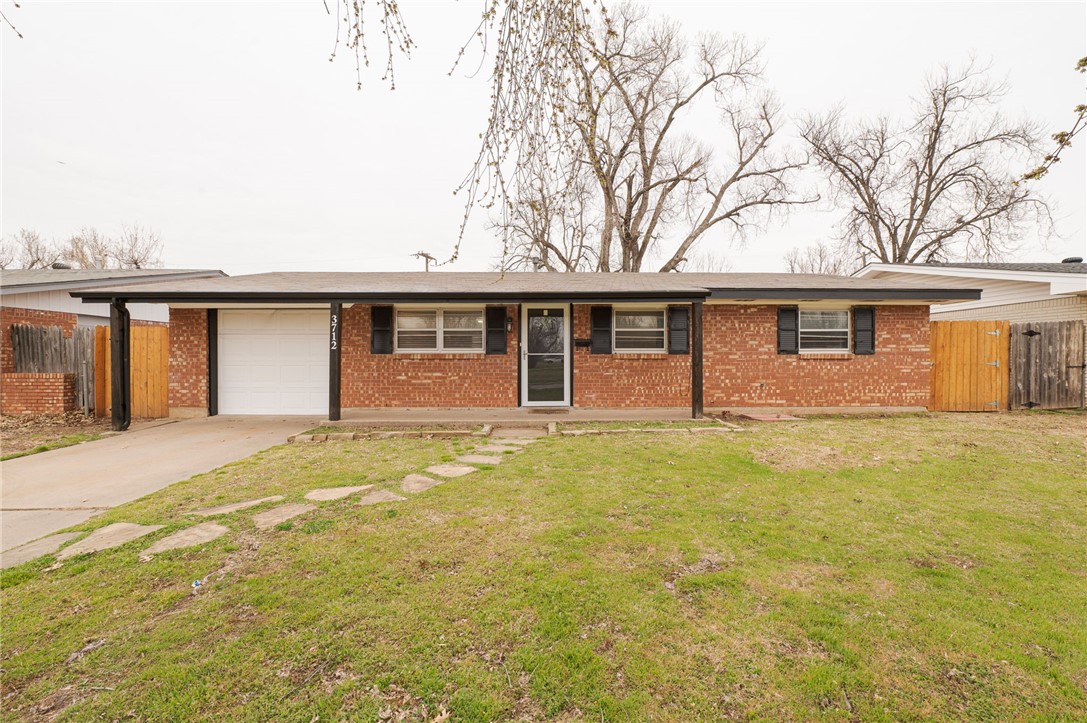 3712 N Markwell Avenue, Bethany, OK 73008 ranch-style home with a front lawn