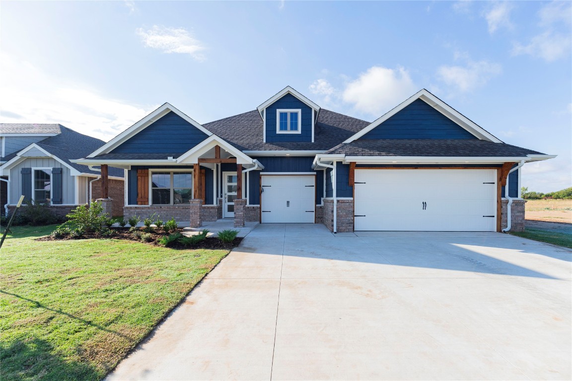 This Shiloh floorplan offers 2,220 Sqft of total living space, which includes 1,950 Sqft of indoor living space & 270 Sqft of outdoor living space. There is also a 625 Sqft three car garage w/ a storm shelter installed. Home offers 4 beds, 2 full baths, 2 covered patios, & a utility room. Great room features a luxurious coffered ceiling, a stacked stone surround gas fireplace, large windows, wood-look tile, & a barn door! Kitchen has stainless steel appliances, cabinets to the ceiling, a center island, stunning pendant lighting, a large corner pantry, & attractive tile backsplash. Primary suite features a sloped ceiling detail, a ceiling fan, & two HUGE walk-in closets. Primary bath has a walk-in shower, a corner Jetta Whirlpool Tub, & separate vanities! Covered back patio includes a wood-burning fireplace, a gas line, & a TV hookup. Other amenities include healthy home technology, a whole home air purification system, a tankless water heater, R-44 and R-15 insulation, & so much more!