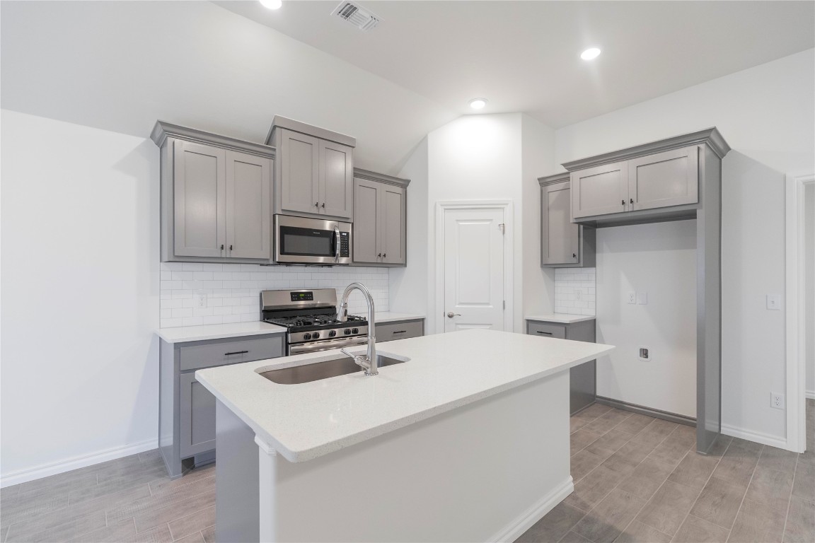 Our Allen floor plan includes 1,765 Sqft of total living space, which includes 1,650 Sqft of indoor living space & 115 Sqft of outdoor living space. There's also a 385 Sqft, two car garage w/ a storm shelter installed. This home offers 4 bedrooms, 2 full baths, an office, covered patios, & a utility room. Great room welcomes large windows, wood-look tile, a ceiling fan, & wires for your TV. Kitchen has granite or quartz countertops, stainless-steel appliances, wood-look tile, well-crafted cabinets w/ decorative hardware, a center island, & stylish tile backsplash. Primary suite is straight ahead & supports carpet flooring, a ceiling fan, & the perfect sized windows. Primary bath suits a dual sink vanity w/ elegant countertops, backsplash, a walk-in shower, an elongated water saving toilet, & a huge walk-in closet! Outdoor living is covered & has fully sodded yards w/ smart home irrigation control. Other amenities include a tankless water heater, a fresh air intake system, & MORE!