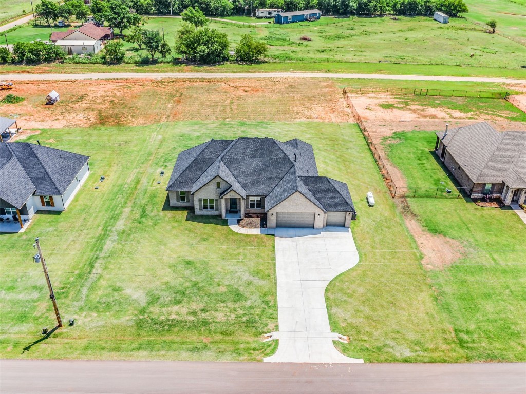 1005 Heritage Hills Drive, Tuttle, OK 73089 view of drone / aerial view