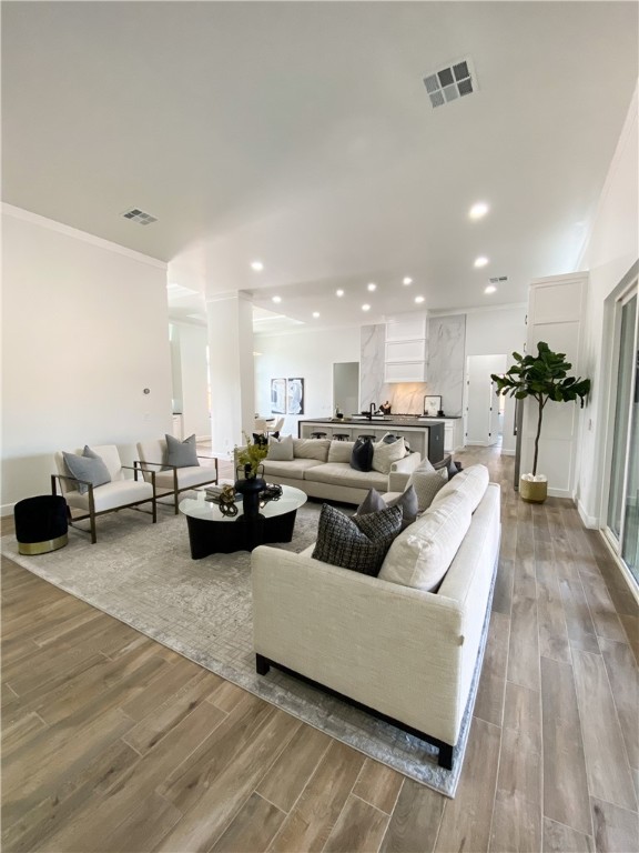 2441 SW 127th Street, Oklahoma City, OK 73170 living room featuring hardwood flooring