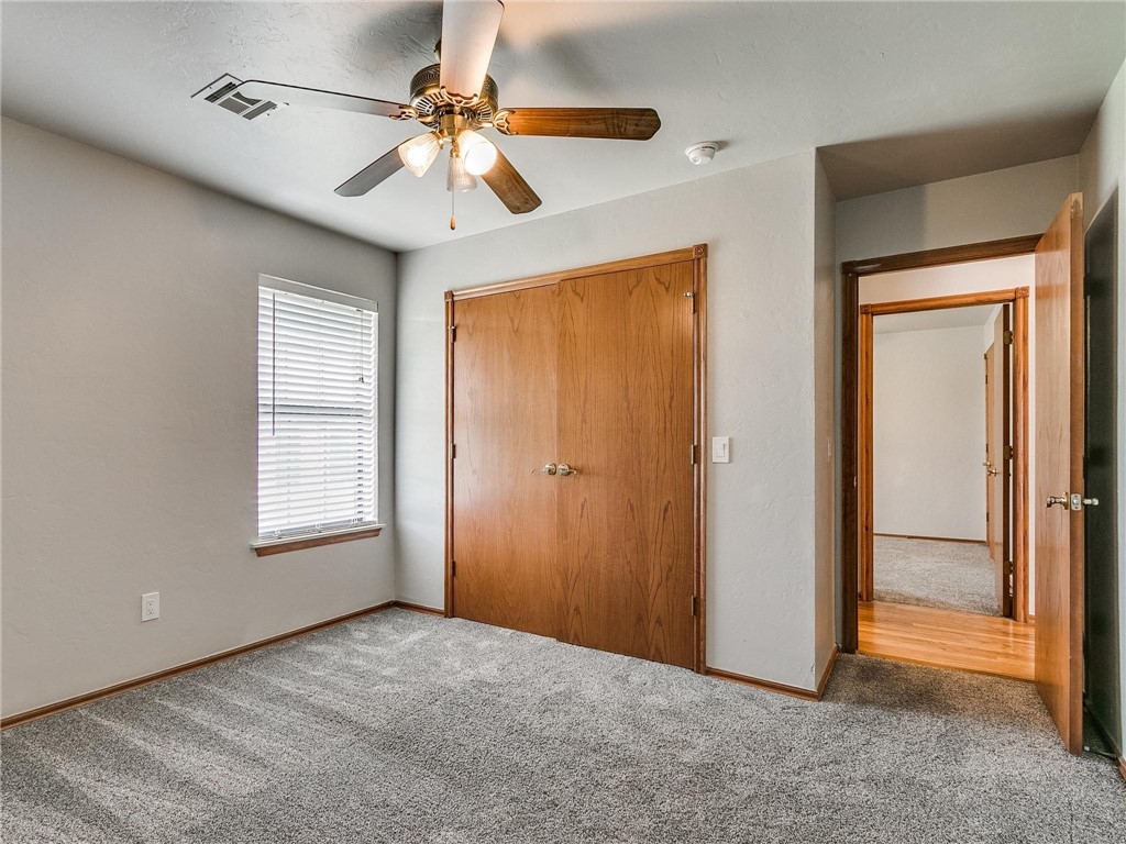 4023 Kittyhawk Drive, Blanchard, OK 73010 bedroom featuring a ceiling fan, carpet, and natural light
