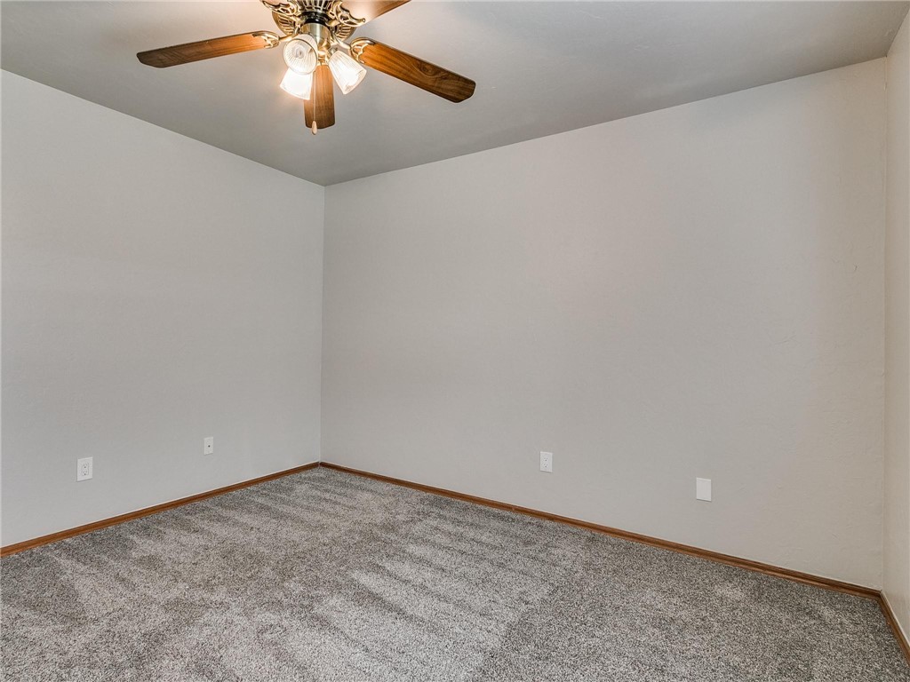 4023 Kittyhawk Drive, Blanchard, OK 73010 empty room featuring a ceiling fan and carpet