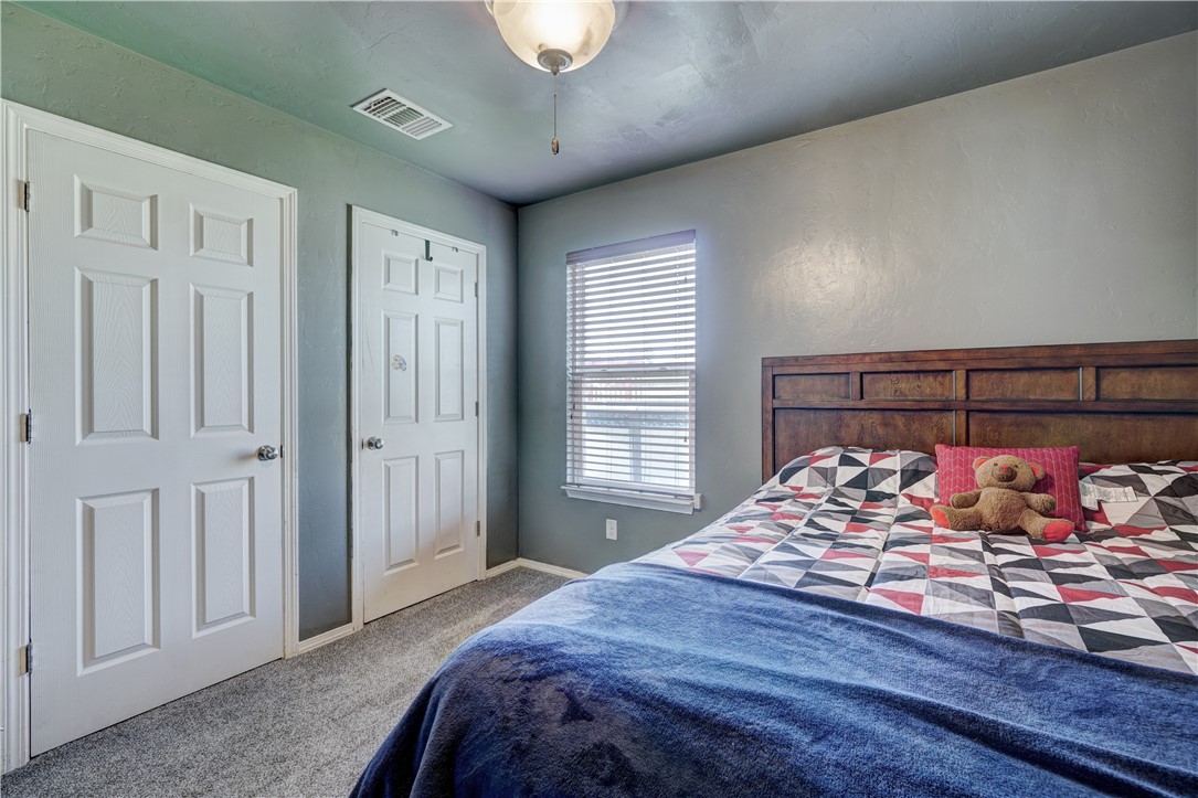 9533 SW 25th Street, Oklahoma City, OK 73128 carpeted bedroom featuring natural light