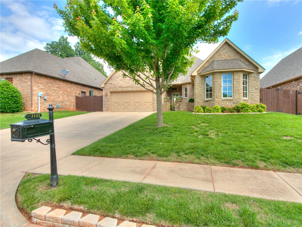Have you dreamed of never cutting your yard again? Envisioned relaxing on your back porch swing while listening to the birds sing? Desired the security of an underground shelter in your garage as you listen to David and Val reporting the latest tornado info? All of this can be yours in this pristine one-owner home in SE Edmond. You will love the primary bedroom with its spacious bathroom, walk-in shower, and oversized closet with builtins and three levels of hanging rails. Meals for family and friends will be easy to prepare when you use the double ovens, 5-burner gas stove, and convenient pot filler. A cheerful window in the roomy laundry room will lessen the drudgery of that chore. Both of the additional bedrooms have double closets, and the front room has a lovely bay window for lots of natural light. Solid wood doors are standard throughout. The large attic is conveniently accessed through a staircase in the garage. Sellers installed a new garage door opener in March. Welcome home!