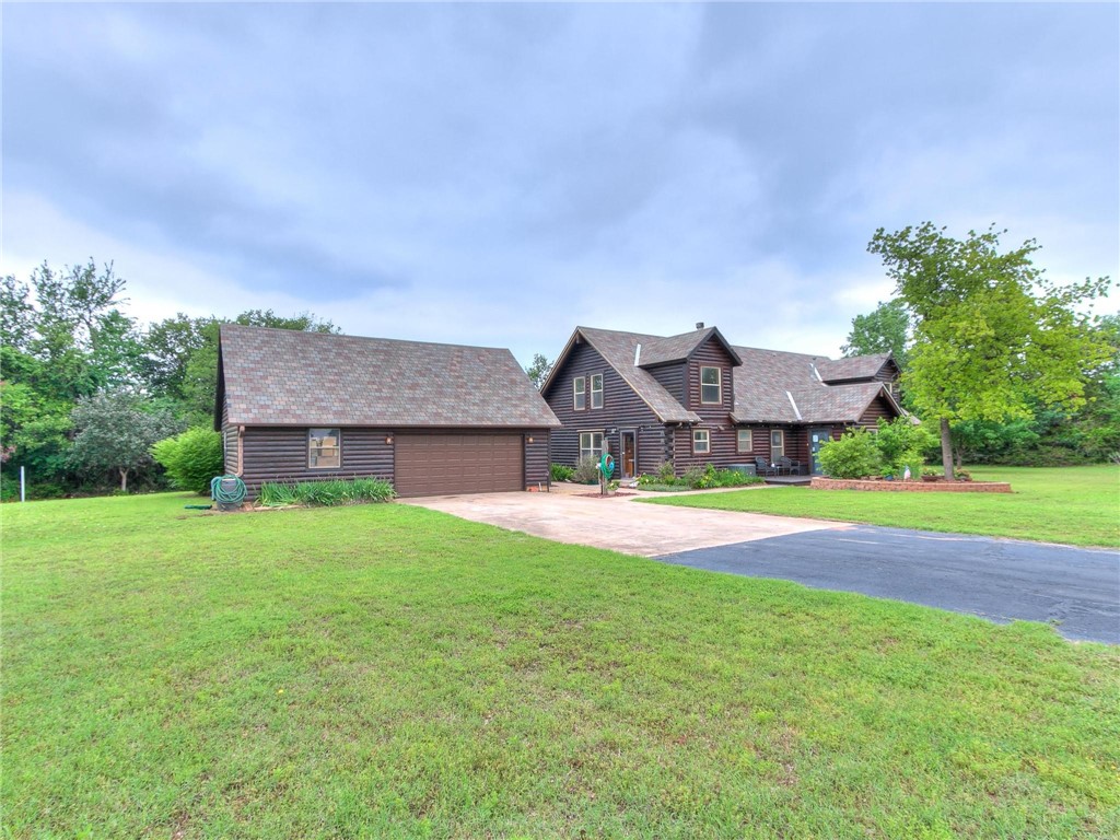 Looking for a little bit country but close to it all? This spacious 3000+ sqft log home is it! A well-constructed home situated on 1.5 acres between Edmond & Guthrie. First floor features kitchen with stone countertops/hardwood cabinets, two dining areas, half bath, family area, central fireplace & master suite with spacious walk-in closet,  bath with double vanities, jetted tub, & walk-in shower. Second floor has two large bedrooms, full bath, & spacious vaulted loft. Added features include cathedral ceilings, granite top vanities, and Pella windows with blind inserts! The outside features a full-length porch, 3-stall garage with overhead storage, shed/green house, lawn irrigation & aerobic septic systems. Recent updates include gas ceramic log fireplace, upgraded HVAC units, water heaters, & septic aerator. Edmond School District, Logan County taxes, private well water and rural water. Association dues for road only. Buyer to verify all info. Check Google Earth for live​​‌​​​​‌​​‌‌​‌‌‌​​‌‌​‌‌‌​​‌‌​‌‌‌ pics.