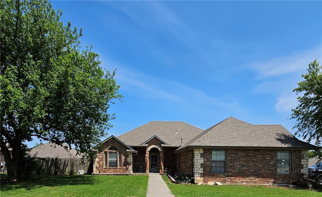 3 bed, 2 baths, 1898sf in Moore schools. Mother-in-law plan offers privacy & functionality. Corner lot over 1/4 acre (.2860 acres). Spacious living area, cozy gas FP for relaxation/entertaining. Kitchen w/ boasts ample cabinet/counter space, SS appliances, breakfast bar. Adjacent to the kitchen, is a separate naturally lit dining area. The master features tray ceilings & an oversized layout that easily accommodates king-size furniture. Luxurious ensuite, complete w/ double vanities, a jetted tub, a standalone shower & two separate closets. Large laundry complete with storage & counter space. BONUS Room between the utility area & the garage that has been transformed into an pet/office room, providing a versatile space that is heated & cooled for optimal comfort & productivity. Features 6 to 8 person storm shelter. Home is nestled in the back of the highly coveted Katie Ridge Addition & is directly across from the neighborhood park & basketball court.